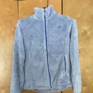 Woman North face purple fleece jacket, zip up front and zip pockets, size small